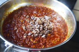 A pot of mackerel (titus) stew with iru.
